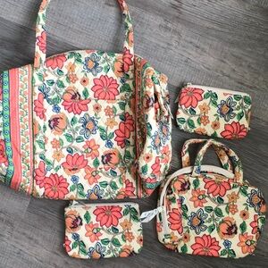 Kim Rogers cream and coral Tote Bags Vibrant Floral Design